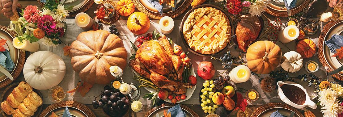 An image of a thanksgiving table full of food